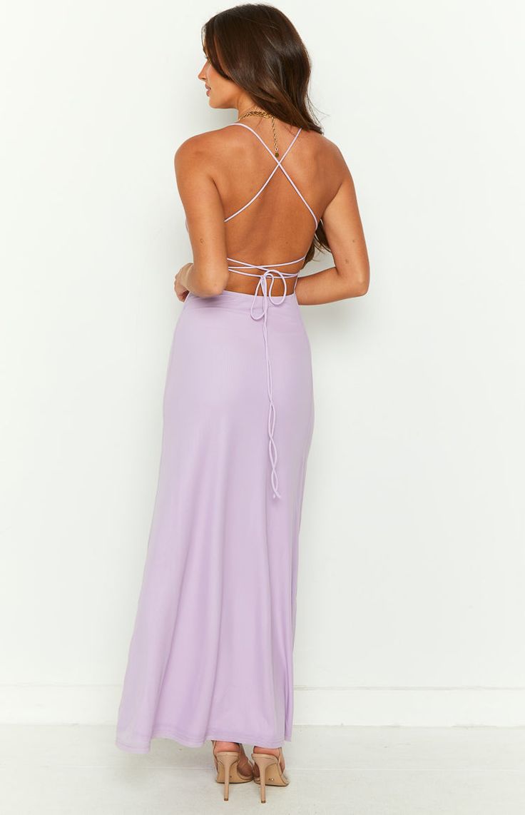 * Purple Mesh Maxi Dress 
 * Your next formal () event is sorted in this stunning lilac mesh maxi dress (). Obsessed with this tie up back style and mesh outer layer. Be sure to add heels () and dainty jewellery for a gorgeous look! 
 * 
 
 * Maxi length 
 * Mid weight material 
 * Lots of stretch 
 * Adjustable criss cross tie up back 
 * Lined 
 * Mesh outer layer 
 * Straight neckline Spring Evening Maxi Dress With Tie Back, Spring Maxi Dress With Lace-up Back, Elegant Lavender Maxi Dress For Prom, Lavender Maxi Dress For Summer Prom, Lace-up Back Maxi Dress For Prom, Summer Prom Maxi Dress With Tie Back, Fitted Tie Back Maxi Dress For Wedding Guest, Spring Formal Maxi Dress With Tie Back, Summer Tie Back Maxi Dress For Prom