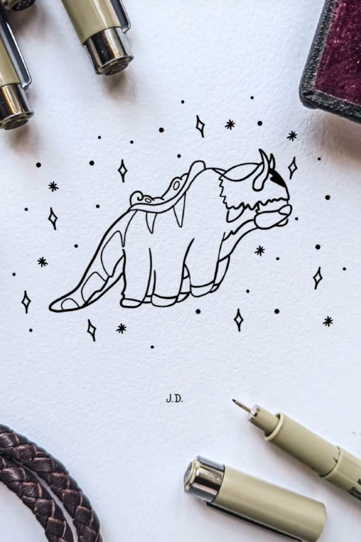 an ink drawing of a horse with stars in the background and writing on paper next to it