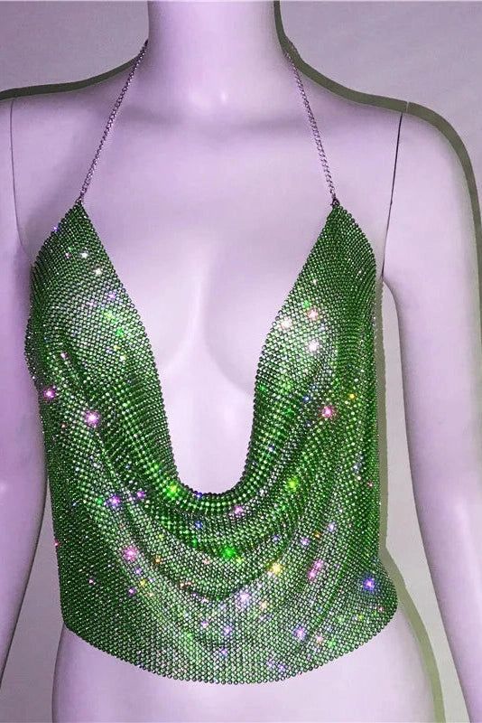 Sparkle in this handmade crop top adorned with shiny rhinestones. The dazzling design and cropped fit make it perfect for adding a touch of glamour to your look. Details: Elasticity: Non Stretch Fabric Type: Broadcloth Material: POLYESTER Size (IN) Bust Waist Length S 29.92-37.01 30.71-37.80 11.02 M 31.50-38.58 32.28-39.37 11.42 L 33.07-40.16 33.86-40.16 11.81 Rhinestone Halter Top For Summer, Glamorous Fitted Crop Top With Rhinestones, Fitted Rhinestone Crop Top For Clubbing, Pink Rhinestone Halter Top, Pink Rhinestone Fringe Crop Top, Handmade Crop Top, The Dazzling, Waist Length, Black Crop Tops