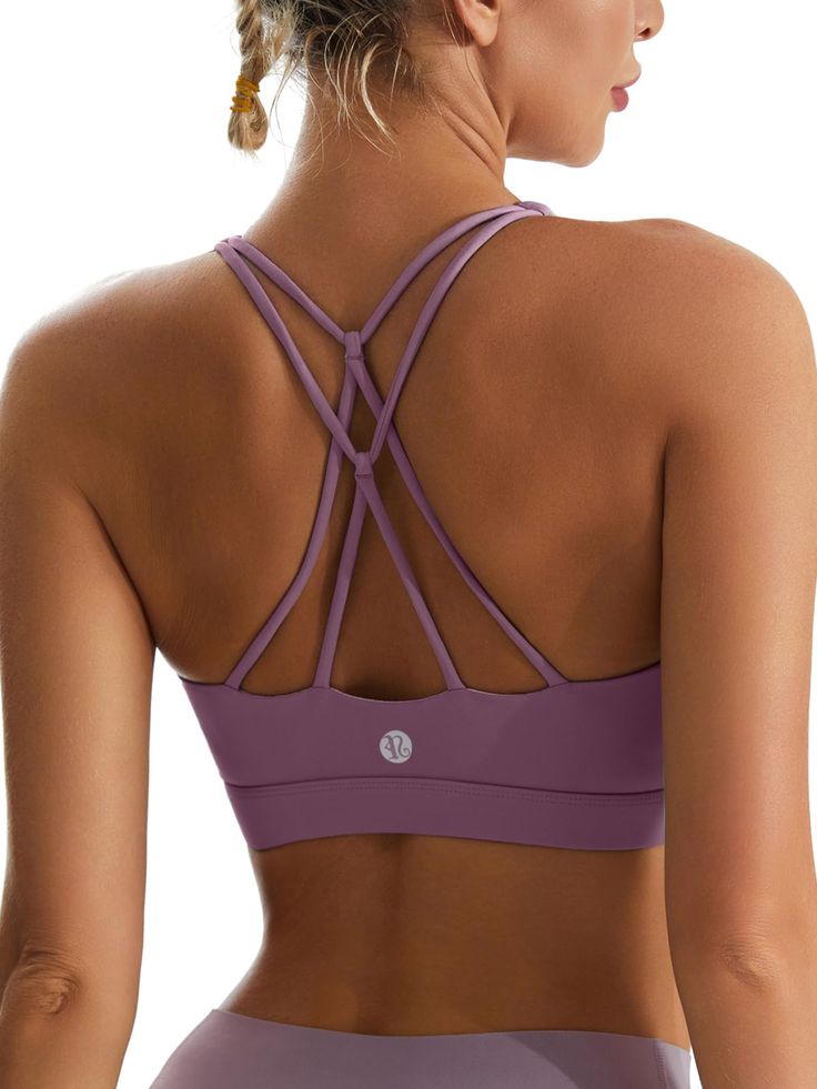 PRICES MAY VARY. √YOU ARE THE FOCUS! - Unique appearance combines strappy style and open cutout design on the back. Stylish cross open back is designed to show your line of sexy back perfectly, Special cutout highlights your personalized style. Trust us, when you put this sexy sports bra tank on, you are the focus! √WANNA NO SWEAT SPORTS? - Our premium fabric is sweat-wicking and four-way stretch which cool to touch and fits like your second skin. Inner mesh line gives a breathable and cool feel Workout Bra With Cross Back Straps, Workout Cross Back Bra, Sports Bra With Adjustable Straps And Cross Back, Crisscross Sports Bra With Adjustable Straps For Workout, Workout Strappy Bra With Adjustable Straps, Strappy Workout Bra With Adjustable Straps, Strappy Gym Bra With Adjustable Straps, Fitted Sports Bra With Adjustable Crisscross Straps, High Stretch Strappy Sports Bra