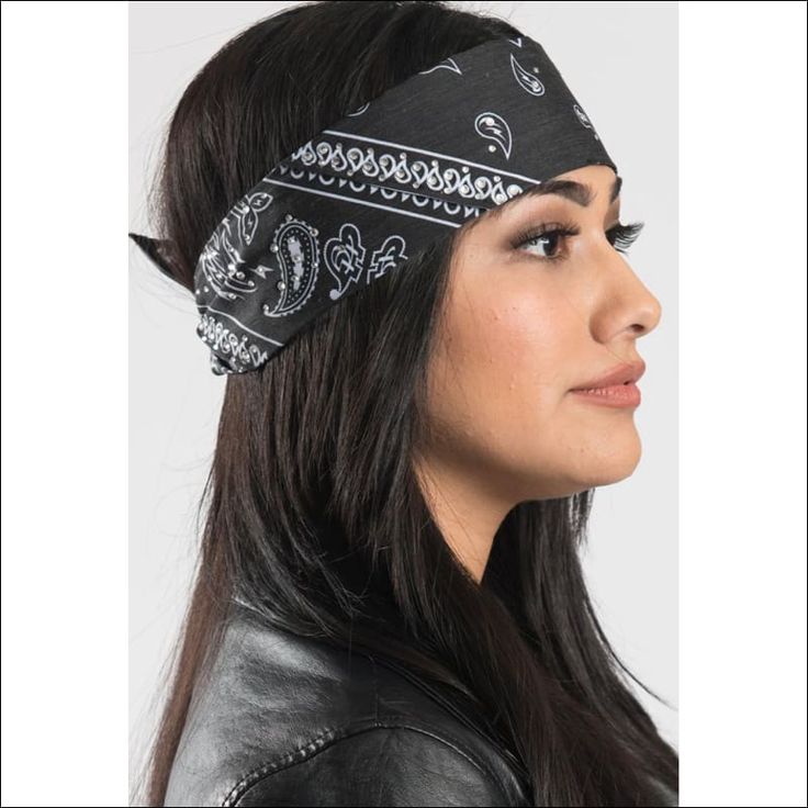 a woman wearing a bandana and leather jacket