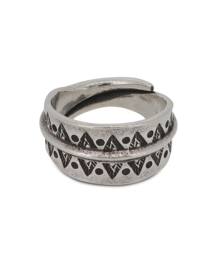 Embark on a journey through Thailand's hilltribe heritage with this evocative silver ring. Designed for both men and women, this ring embodies the spiritual connection of tribal stories etched onto genuine Hilltribe silver. Featuring a harmoniously crafted circular band, the ring narrows gracefully towards the back, ensuring a comfortable fit. Adorning the circumference are distinctive triangular tribal etchings, each one a whisper of ancient lore and tribal tales. Available in sizes 8 through 1 Traditional Adjustable Engraved Ring, Traditional Adjustable Engraved Etched Ring, Adjustable Traditional Engraved Etched Ring, Adjustable Symbolic Festival Rings, Adjustable Engraved Antique Silver Ring, Traditional Adjustable Sterling Silver Engraved Ring, Adjustable Bohemian Antique Silver Ring, Adjustable Silver Engraved Ring With Oxidized Finish, Adjustable Silver Ring With Oxidized Finish