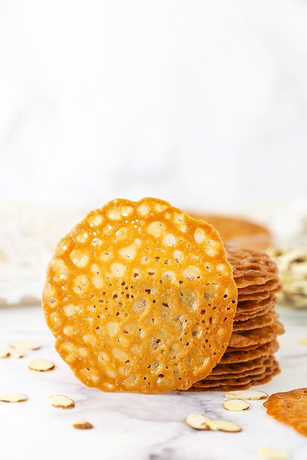 a stack of crackers sitting on top of each other next to oatmeal