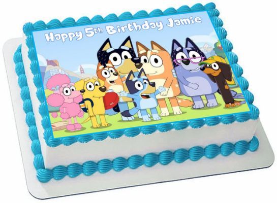 a birthday cake with cartoon characters on it