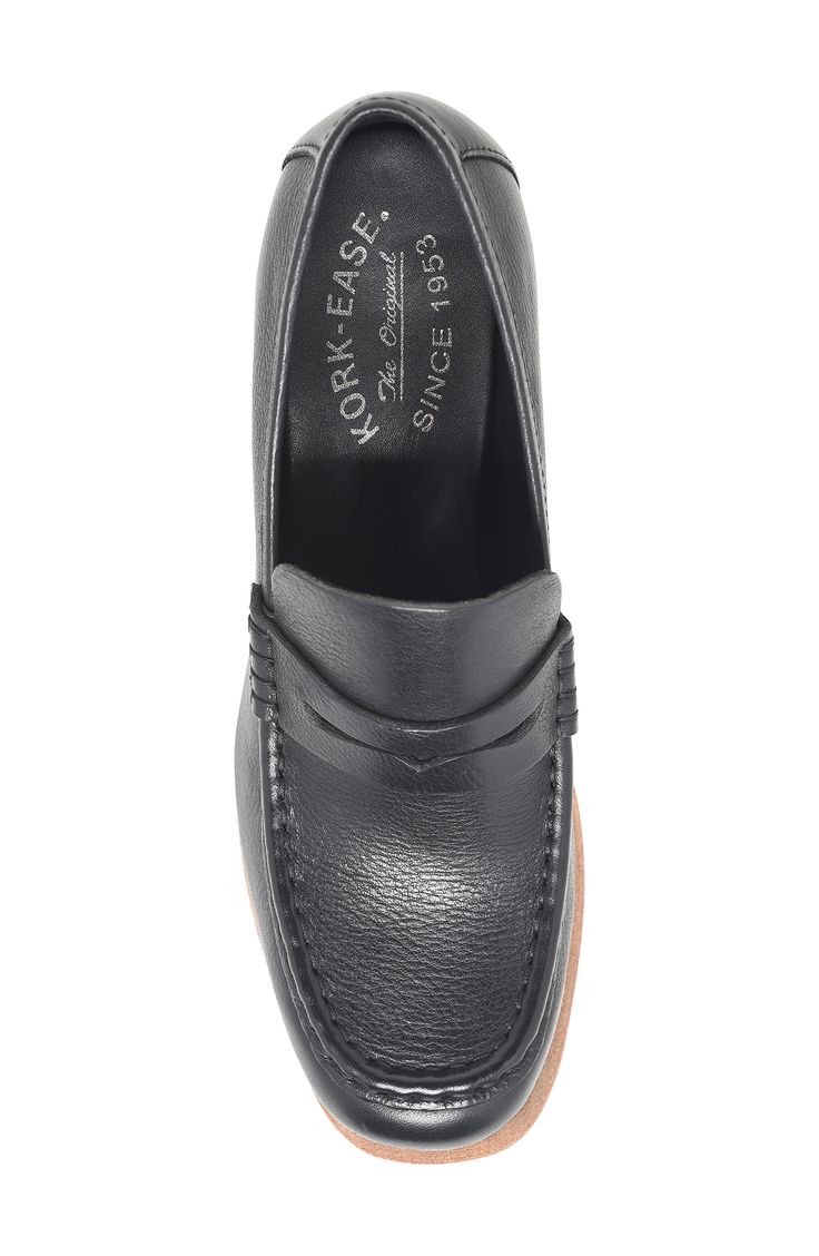 A classic penny keeper and loafer-inspired topline enrich a contemporary leather pump set on a stacked platform and block heel. 3 1/2" heel; 1 1/4" platform Cushioned footbed Leather upper/textile lining/rubber sole Imported Classic Black Platform Loafers With Removable Insole, Classic Black Platform Loafers With Plain Toe, Classic Black Plain Toe Platform Loafers, Classic Black Platform Loafers With Moc Toe, Classic Black Moc Toe Platform Loafers, Modern Formal Loafers With Platform, Classic Platform Slip-on Loafers, Classic Platform Loafers With Removable Insole For Office, Classic Leather Platform Oxfords