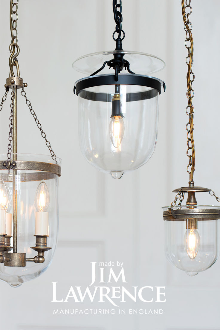 three glass hanging lights with chains attached to each light fixture and the words, i am lawrencece manufacturing in england