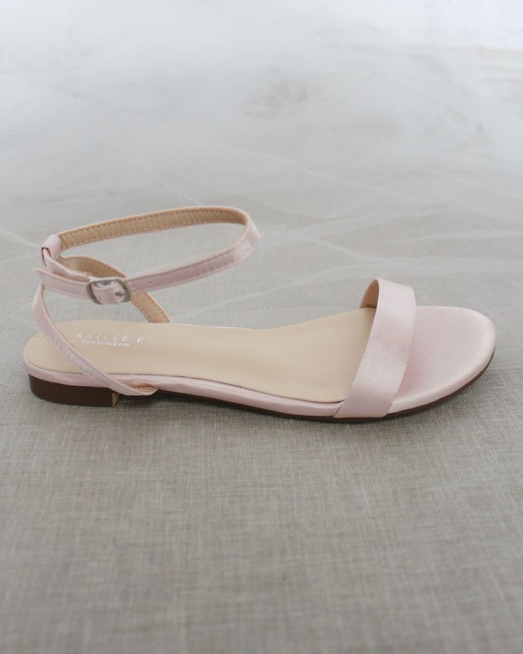 Classy satin flat sandals with ankle strap. Effortless yet adorable to wear on your favorite occasion. Can be pair with dress or casual look.DETAILS:UPPER: Synthetic upper and liningMATERIALS: Manmade outsoleHEEL HEIGHT: 0.4"ORIGIN: Imported Light Pink Flats, Peach Sandals, Women's Slip Ons, Girls Flats, Girls Heels, Pink Flats, Bridesmaid Shoes, Fashion Sandals, Kids Sandals