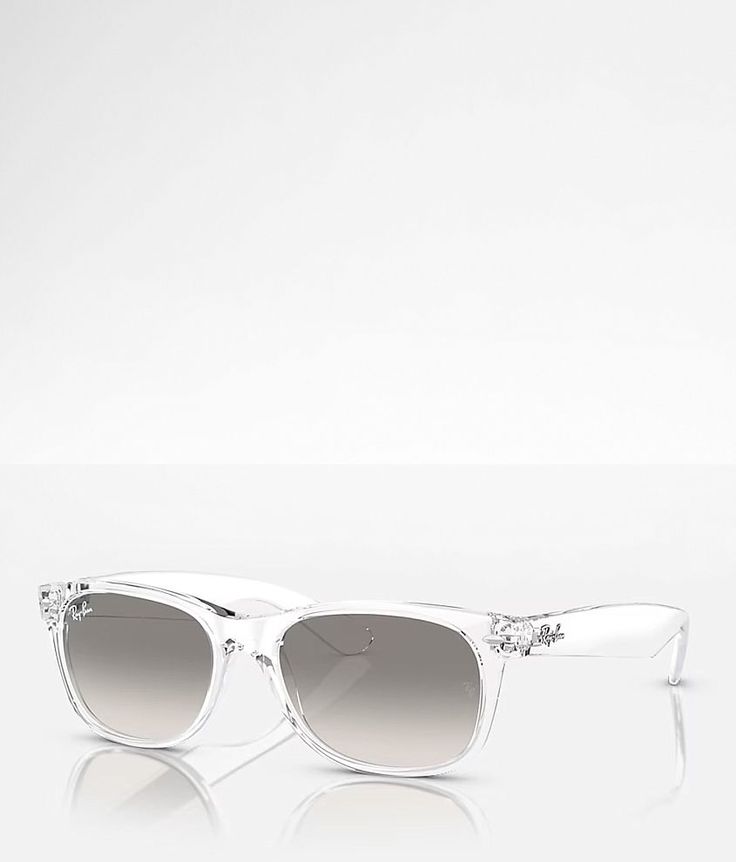 Ray-Ban New Wayfarer Sunglasses - White , Women's Transparent Transparent plastic frame sunglasses Gradient grey lenses 100% UV protection Soft shell case included. Apparel & Accessories Casual Clear Wayfarer Sunglasses, Classic Clear Sunglasses With Anti-reflective Coating, Classic Clear Wayfarer Sunglasses, Glass Wayfarer Sunglasses With Uva Protection, Everyday Wayfarer Glass Sunglasses, Everyday Wayfarer Sunglasses With Glass Lenses, Clear Polycarbonate Wayfarer Sunglasses, Everyday Glass Wayfarer Sunglasses, White Wayfarer Sunglasses In Polycarbonate