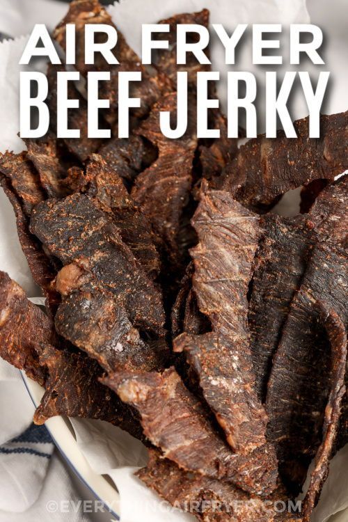 air fryer beef jerk on a plate with text overlay