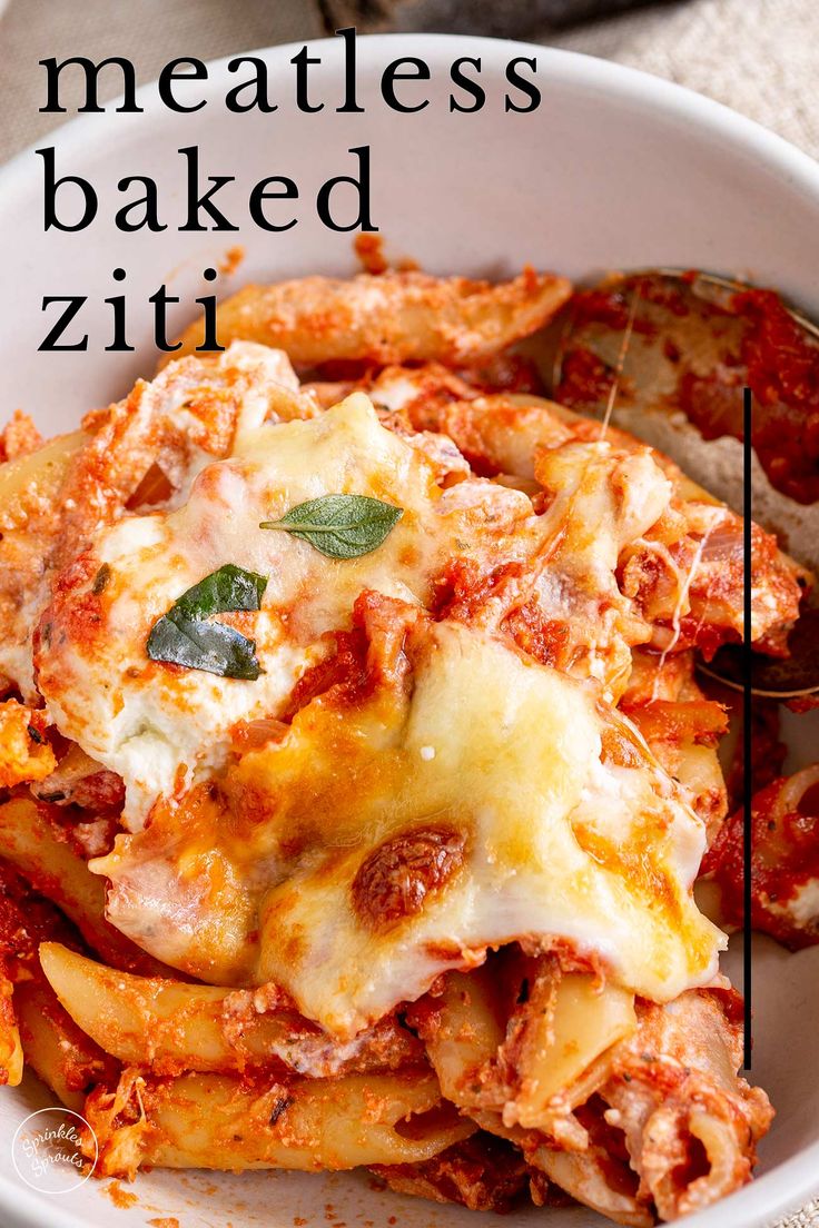 a white bowl filled with meatless baked ziti