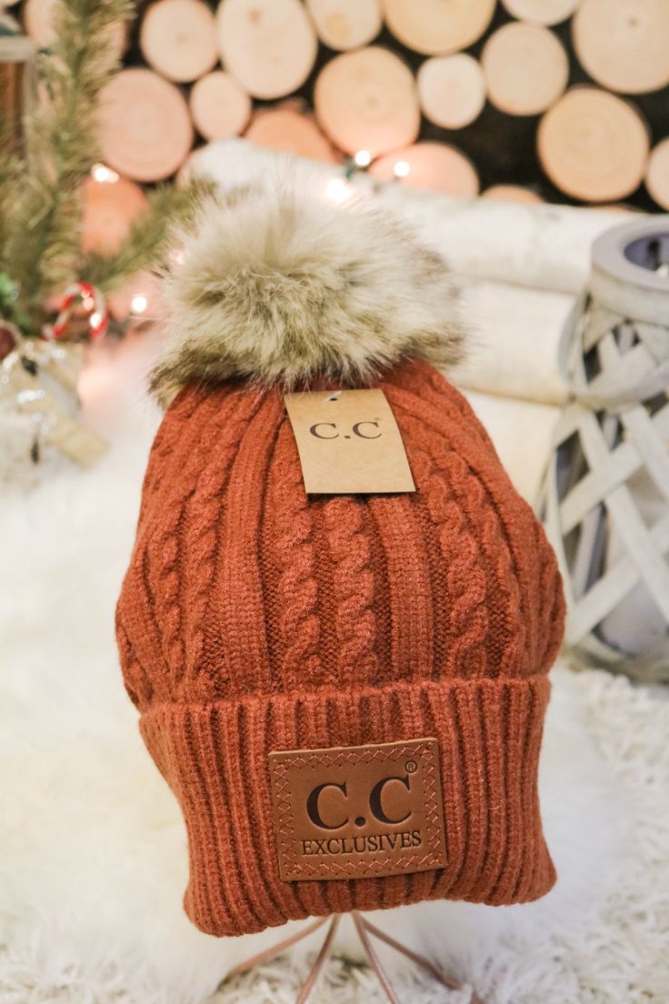 Cable knit foldover beanie with faux fur pom. Available in 6 colors Cable Knit Beanie, Alice And Wonderland Quotes, Wonderland Quotes, Beanie Style, Pom Beanie, Fur Pom Pom, Ear Warmers, Clothing Co, Clothing Boutique