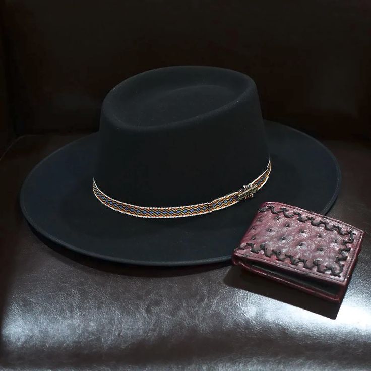 A new Stetson style in the Medalist Collection, the Yancy is an mix of gambler and fedora hat featuring a blend of high-grade Merino wool with a hint of fur felt to provide structural integrity. Featuring a telescope crown, flat brim, bound edge and eye-catching band, it is perfect for outdoors. A great accessory for Gambler Hat, Adventure Hat, Outdoor Hat, Western Cowboy Hats, Outdoor Hats, Hat Band, Fedora Hat, Wool Hat, Western Cowboy