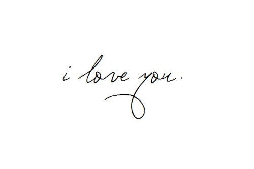 the words i love you written in cursive handwriting