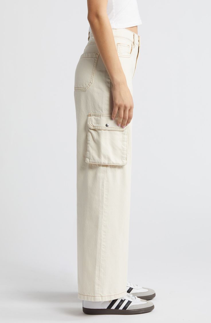 Contrast stitching adds to the vintage vibe of these high-rise, full-length wide-leg pants equipped with trend-right cargo pockets. 31 1/2" inseam, 24" leg opening; 12" front rise; 14" back rise (size 29) Zip fly with button closure Five-pocket style; cargo bellows pockets 100% cotton Machine wash, tumble dry Imported High Waist Cargo Jeans With Flap Pockets For Spring, Casual High Rise Wide Leg Pants With Patch Pockets, Casual High-rise Wide Leg Pants With Patch Pockets, Full-length Cargo Jeans For Spring Workwear, Full Length Cargo Jeans For Workwear In Spring, Spring Workwear Full-length Cargo Jeans, Beige Cargo Jeans With Side Pockets, Spring Wide Leg Jeans With Flap Pockets, Utility High Rise Beige Cargo Pants