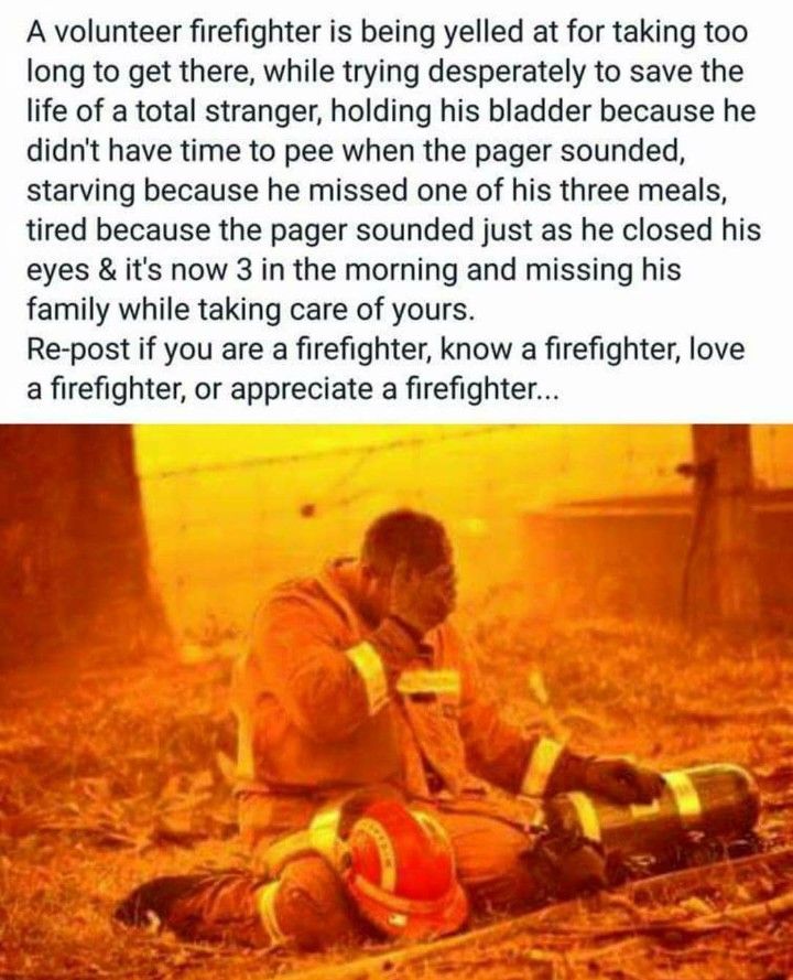 a firefighter is sitting on the ground with his hand in his pocket and looking at something