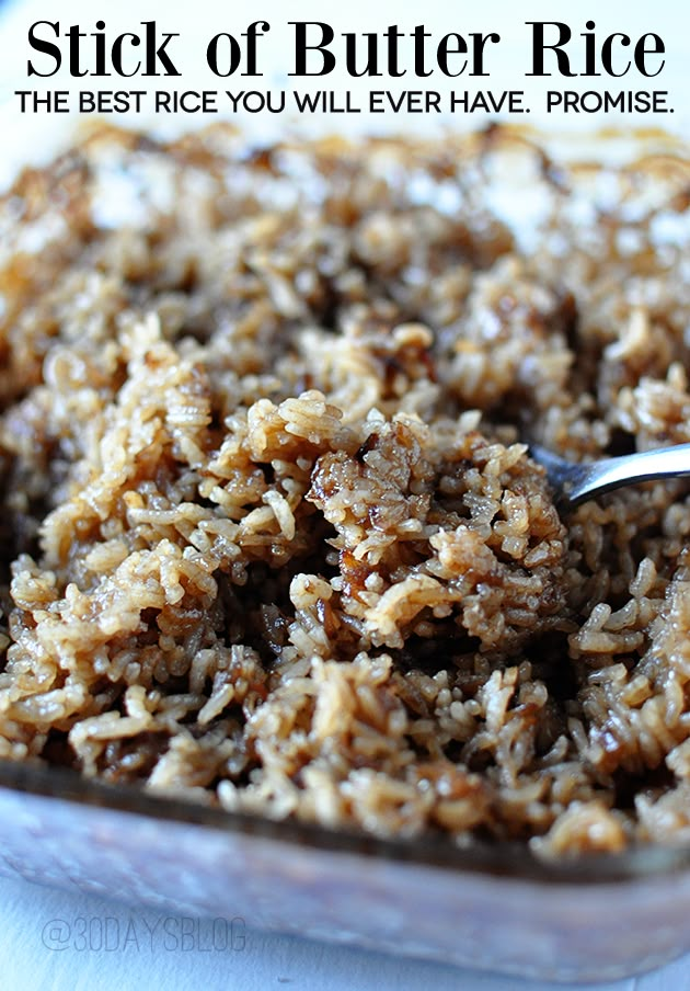 a close up of food on a spoon in a bowl with words above it that say, stick of butter rice the best rice you will ever have