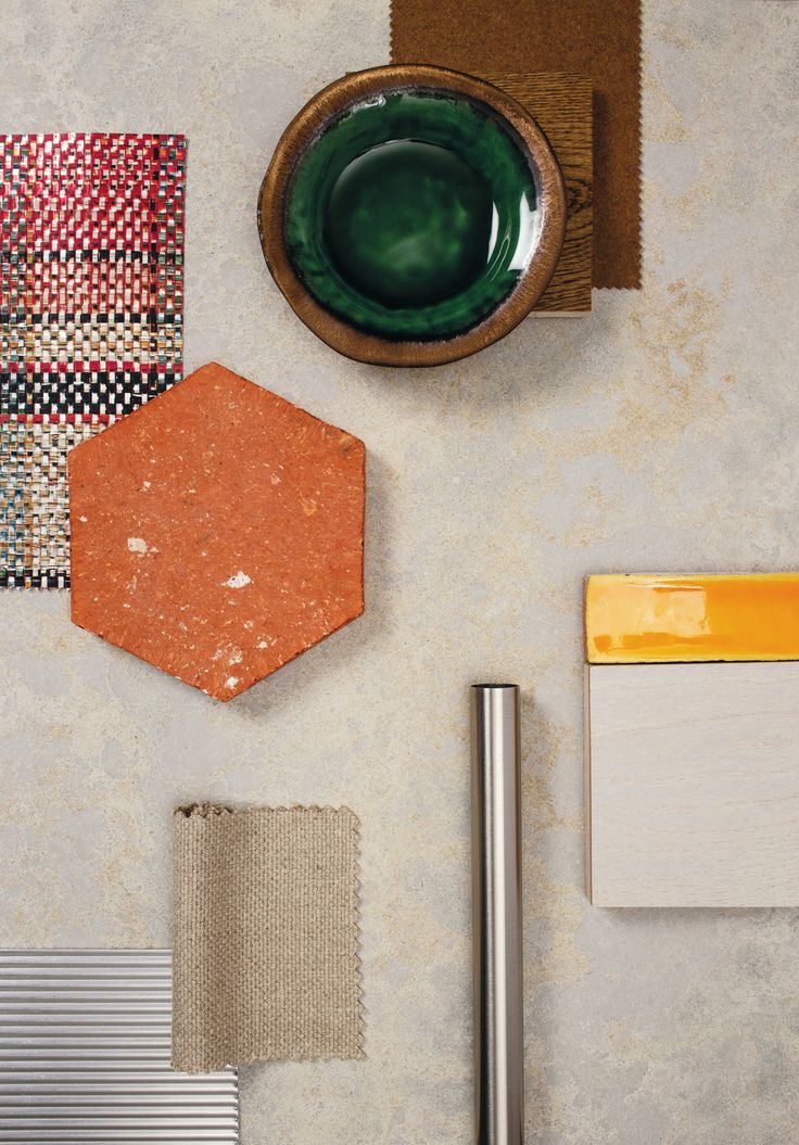 a table topped with different types of tile and materials on top of it's surface