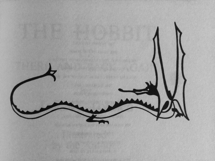 a drawing of a dragon on top of a page in a book with writing underneath it