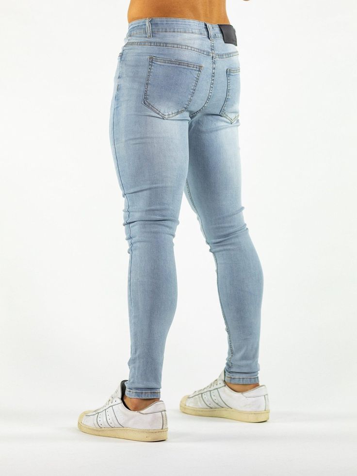 Ultra Stretch Jeans - Muscle Skinny Fit - Light Blue Wash-Kojo Fit Casual Slim Stretch Pants, Stretch Medium Wash Tapered Leg Pants, Stretch Tapered Leg Medium Wash Pants, Casual Slim Stretch Bottoms, Sporty Stretch Denim Bottoms, Slim Stretch Blue Bottoms, Medium Wash High Rise Fitted Pants, Slim Stretch Denim Blue Bottoms, Slim Stretch Blue Pants