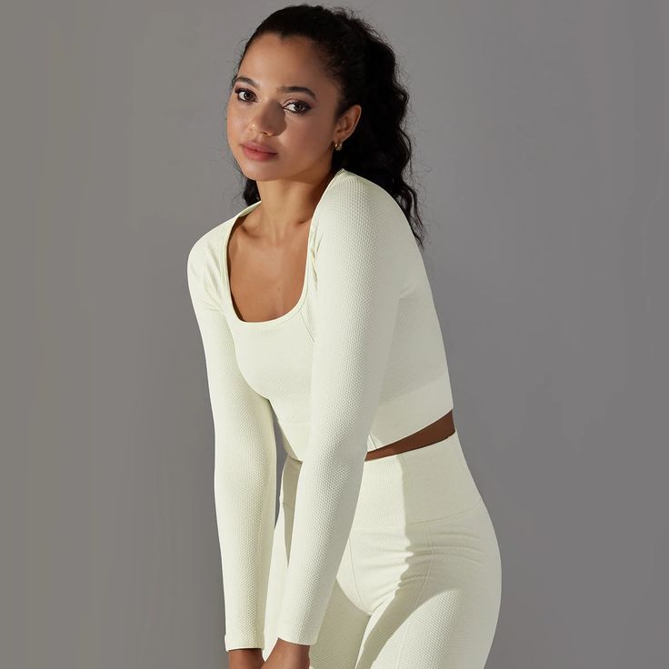 Experience the serenity of seamless comfort and style with our Seamless Serenity Long Sleeve Top. Elevate your wardrobe with this essential piece that offers endless outfit possibilities and the assurance of lasting quality. Make it your go-to choice for an effortlessly chic look.✔️Flattering body seamlines✔️Nylon and spandex✔️Long sleeve ✔️Fitted long-sleeve ✔️Fabric feels, lightweight, soft & stretchy Versatile Seamless Tops For Loungewear, Elegant Seamless Stretch Crop Top, Elegant Stretch Seamless Crop Top, Soft Stretch Seamless Tops For Loungewear, Seamless Soft Stretch Tops For Loungewear, Supportive Solid Tops For Spring, Versatile Seamless Tops, Seamless Solid Color Crop Top For Loungewear, Solid Color Supportive Seamless Top