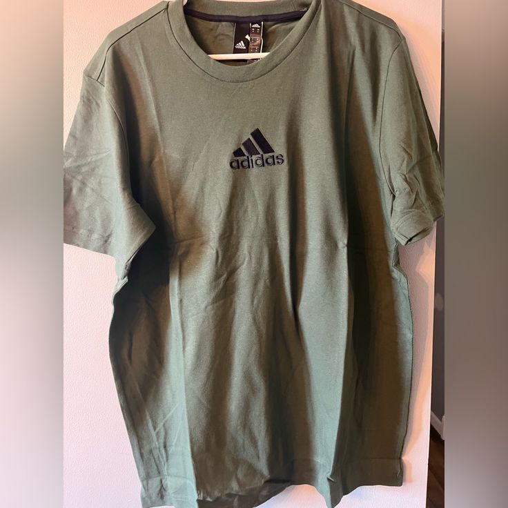 New Men’s Adidas Shirt Size Medium Casual Green Adidas T-shirt, Casual Green Adidas Tops, Adidas Green Crew Neck T-shirt, Adidas Green T-shirt With Graphic Print, Adidas Green Cotton T-shirt, Green Adidas Crew Neck T-shirt, Adidas Green Short Sleeve T-shirt, Green Adidas Cotton T-shirt, Adidas Green T-shirt For Streetwear