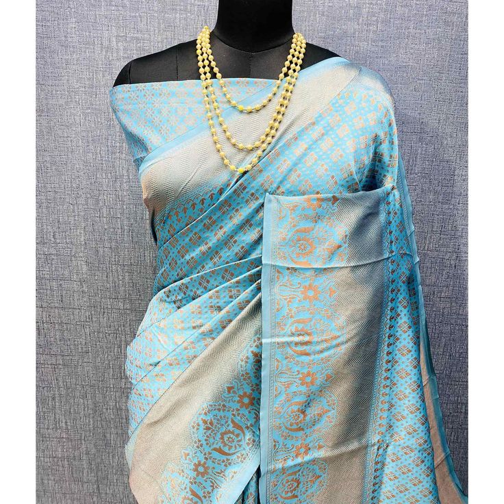 Light Blue colored saree is made from banarasi silk fabric which is highlighted with beautiful weaving work as shown. Comes along with unstitched banarasi silk blouse piece which you can customise as per your design/style. Occasion - You can wear this saree for festivals and functions. Note:- the actual product may differ slightly in color and design from the one illustrated in the images when compared with computer or mobile screen. Measurements: Saree : Banarasi Silk : 5.5 Mtrs Blouse : Banarasi Silk : 0.8 Mtr Material: Banarasi Silk Stitch Type: Unstitched Country of Origin: India Care Guide: Dry Clean Elegant Blue Pre-draped Saree For Puja, Blue Jamawar Pre-draped Saree With Zari Weaving, Blue Bollywood Banarasi Silk Pre-draped Saree, Blue Pre-draped Saree With Zari Weaving, Blue Katan Silk Pre-draped Saree, Blue Katan Silk Pre-draped Saree With Zari Work, Designer Unstitched Blue Saree, Designer Blue Unstitched Saree, Blue Semi-stitched Tussar Silk Blouse Piece