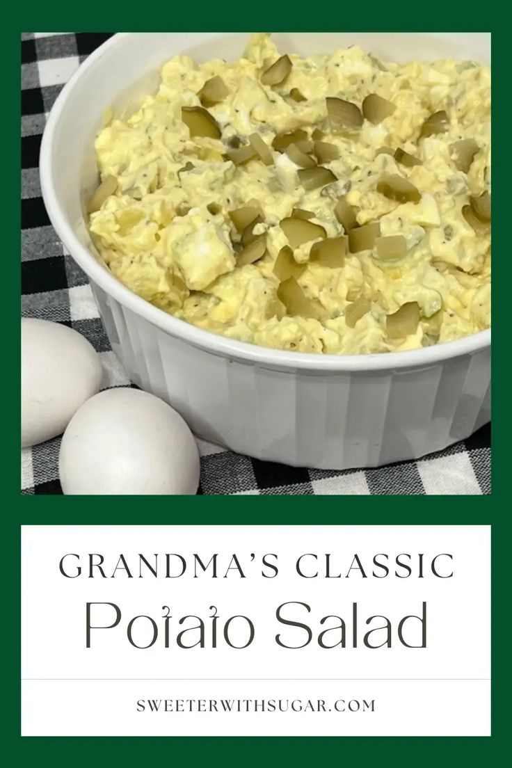 a white bowl filled with potato salad next to eggs on a checkered table cloth