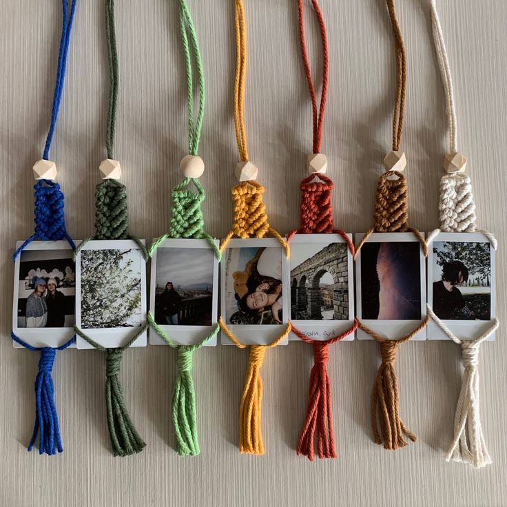 several different colored cords with pictures attached to them