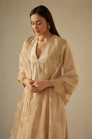 Shop for Sureena Chowdhri Beige Silk Chanderi Flared Kurta Set for Women Online at Aza Fashions Festive Kurta With Lace Work And Traditional Drape, Festive Lace Work Kurta With Traditional Drape, Designer Lace Work Kurta With Traditional Drape, Designer Kurta With Lace Work And Traditional Drape, Designer Wear Kurta With Lace Work And Traditional Drape, Bollywood Style Chanderi Kurta With Lace Work, Traditional Designer Palazzo Set With Lace Work, Designer Wear Kurta With Lace Work, Bollywood Style Festive Kurta With Lace Work