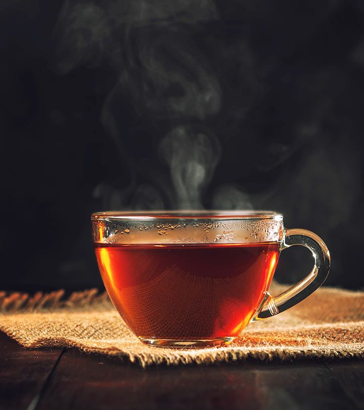 a cup of tea with steam rising from it