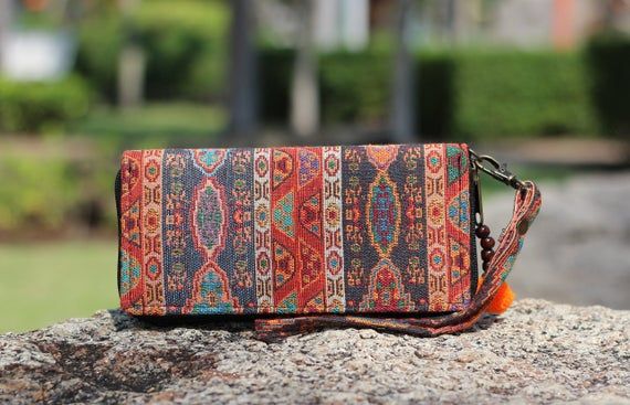 #bagspurses #walletsmoneyclips #wallets #veganwallet #bohopurse #clutchpurse #travelwallet #zipperwallet #walletsforwomen #fabricwallet #wristletwallet #phonewallet #cardholder #birthdaygift #cardwallet #moroccanoriental Pom Pom Charm, Bohemian Fabric, Funky Hats, Boho Clutch, Vegan Purses, Vegan Wallet, Fabric Wallet, Boho Purses, Travel Wallet