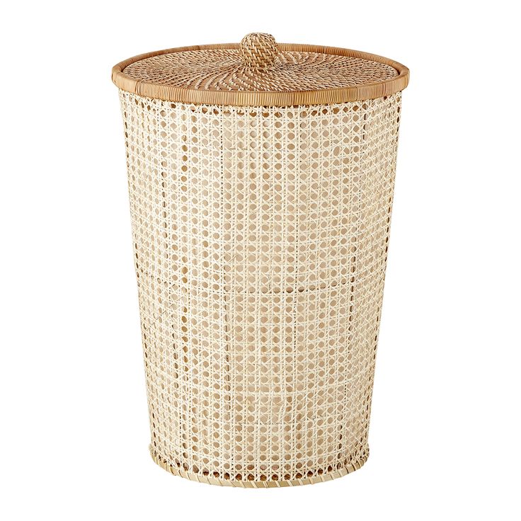 a white wicker trash can with lid