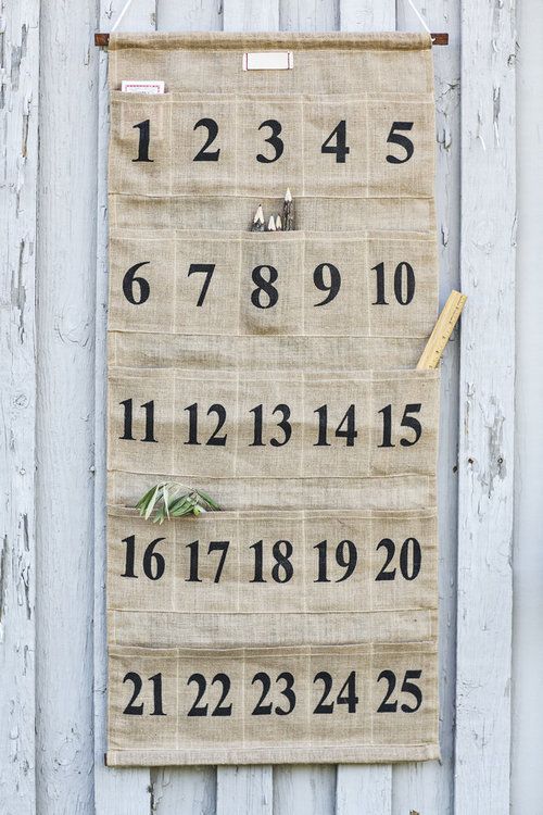 a burlap sign with numbers on it