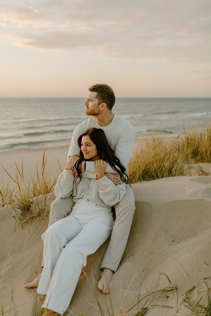 Lake Michigan Beach engagement photos, Michigan wedding photographer, sunset engagement photos on the beach, Lake Michigan photoshoot, West Michigan photographer, candid engagement photos, engagement photo poses, engagement photo inspiration, neutral casual engagement photo outfits Sunset Photo Shoot Outfits, Indiana Dunes Photoshoot, White Dress Beach Engagement Pictures, Couple Beach Pictures Outfits Casual, Jeans Beach Engagement Photos, Lake Michigan Beach Wedding, Oregon Beach Photoshoot, Winter Family Beach Photos, Winter Beach Engagement Photos Outfits