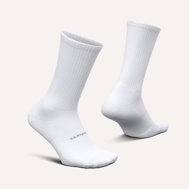 High Performance socks are superior to conventional socks because of their seamless toe, moisture wicking fibers and snug fit. Power bands of Lycra hug your entire foot for maximum support. This snug, supportive fit eliminates movement to prevent blisters. High density cushioning provides extra protection in high impact areas. iWick® fibers wick moisture to keep feet cool and dry, while providing superior durability. Mesh construction on top of the sock provides ventilation for added breathabili Functional Slip-resistant Gym Socks, Slip-resistant Comfortable Training Socks, Sporty Socks With Arch Support And Micro-elastic Fit, White Stretch Socks With Arch Support, Slip-resistant Comfortable Gym Socks, Slip-resistant Training Socks, Sporty No-show Socks With Arch Support, Antimicrobial Stretch Sports Socks, Breathable No-show Functional Socks