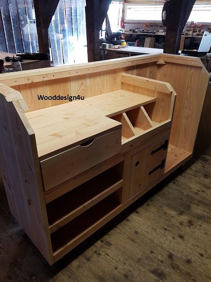 a woodworking bench with two drawers on it