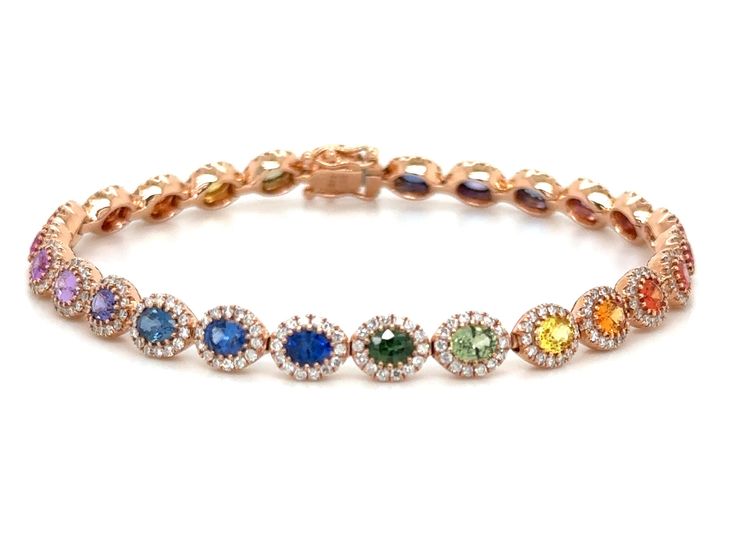 This stunning 7.15ct tw oval-cut rainbow sapphire and diamond tennis bracelet will add a touch of glamour and color to any outfit. Featuring a beautiful array of vibrant rainbow sapphires and sparkling diamonds, this bracelet is the perfect accessory for any occasion. Elevate your style and make a statement with this exquisite gemstone bracelet. Metal: 18K Rose GoldRainbow Sapphire Weight: (26) 5.41ct t.w. / Diamond Weight: 364 Round Brilliant cuts 1.74ct tw Bracelet Length: 17.5cm - W: 6mm Rainbow Sapphires, Gems Bracelet, Bracelet Metal, Plants Indoor, Diamond Tennis Bracelet, Jewelry Lookbook, Tennis Bracelet Diamond, Gem Stone, Sparkle Diamonds