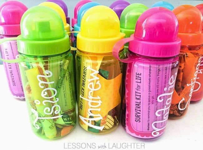 there are many different colored baby bottles lined up