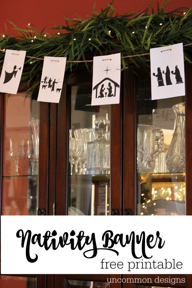 a display case with christmas decorations on it and the words nativity banner free printable