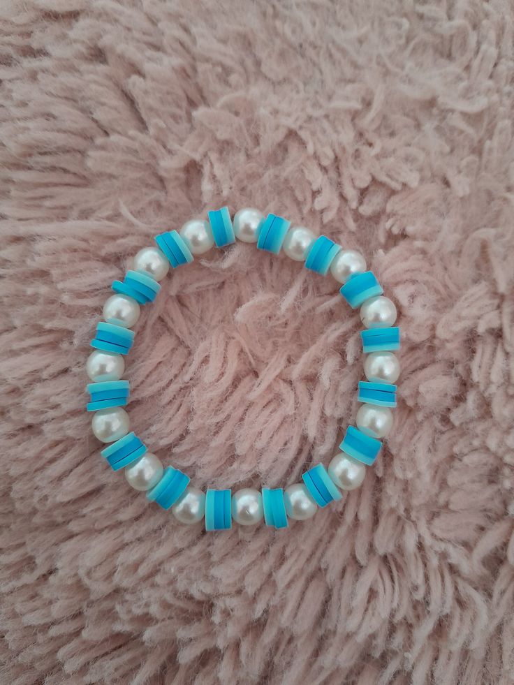 a cute simple blue and pearl bracelet 🫧 Handmade Turquoise Pearl Bracelets, Cute Adjustable Pearl Bracelet, Adjustable Cute Pearl Bracelet, Blue Pearl Bracelet Gift, Blue Pearl Beaded Bracelets With Pearl Charm, Blue Beaded Bracelet With Pearl Charm, Blue Pearl Bracelets With Pearl Charm, Cute Blue Bracelet Jewelry, Blue Beaded Bracelet With Pearl Charm As Gift