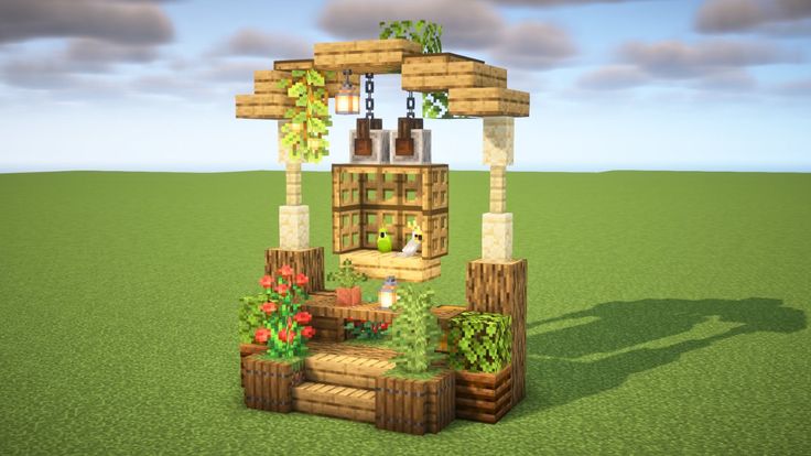 a small wooden structure with plants growing out of it