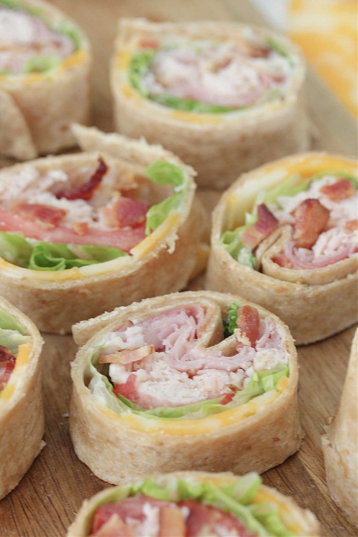 ham and turkey club pinwheels with text overlay