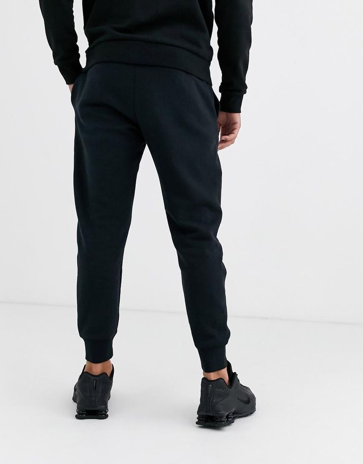 Sweatpants by Nike This item is excluded from promo Drawstring waistband Side pockets Fitted cuffs Slim fit A narrow cut that sits close to the body Nike Joggers With Pockets, Nike Joggers With Side Pockets, Black Cotton Joggers With Elastic Cuffs, Fitted Black Sweatpants With Ribbed Waistband, Black Jogging Pants With Elastic Cuffs, Nike Jogging Pants With Ribbed Waistband, Nike Streetwear Pants With Comfort Waistband, Black Athleisure Joggers With Elastic Cuffs, Nike Pants With Comfort Waistband For Streetwear