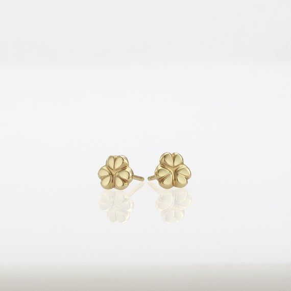 Shiny stud gold flower earrings, handmade of yellow solid 14k gold.These small dainty earrings are perfect for every day’s wear. They are small but well noticeable.Smooth and shiny, and comfortable to wear.These beautiful classy earrings can be a great gift as they can be enjoyed at any age and outfit.14k solid gold ear backs are included.Flower’s diameter is approx 6 mm =  ~0.24 inch each* The earrings will be packed in a gift box ready to give as a gift *To see more gold earrings click here: h 14k Yellow Gold Flower Earrings For Anniversary, Gold Flower Charm Earrings In 14k Gold, Fine Jewelry Yellow Gold Flower Earrings, 14k Yellow Gold Flower Earrings Fine Jewelry, Wedding Flower Earrings In 14k Yellow Gold, 14k Gold Earrings With Flower Charm For Gift, Yellow Gold Flower Earrings In 14k, 14k Yellow Gold Flower Earrings, Delicate 14k Gold Flower Earrings