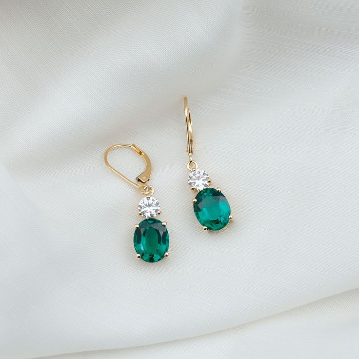 Product Details Flaunt these effortless Emerald Drop Earrings and make a sophisticated statement every time you go out. The 8X10 MM Lab Grown Emerald elegantly set in prong setting accompanied by Round Moissanite sparkling from the top of it. Feel free all the time when you wear these emerald earrings as they are crafted with lever back closures which keep them safe in the earlobe and provide you with all-day comfort. Get this gorgeous pair for yourself or surprise your beloved by presenting the Emerald Wedding Earrings, Emerald Earrings Drop, Lab Created Emerald, Emerald Wedding, Head Jewelry, Special Occasion Outfits, Round Moissanite, Emerald Earrings, Ear Jewelry