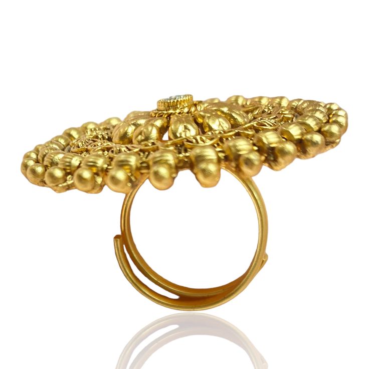 Discover timeless elegance with our Reena Adjustable Antique Gold Ring, a captivating piece of Indian and Pakistani jewelry craftsmanship. This exquisite ring boasts intricate details reminiscent of traditional designs, exuding sophistication and charm. Crafted with precision and adorned with a mesmerizing clear stone at its center, it epitomizes the fusion of heritage and modernity. Embrace the allure of gold-plated Indian jewelry with this stunning accessory, perfect for adding a touch of luxu Antique Gold Rings, Pakistani Jewelry, Clear Stone, Modern Bridal, Individual Style, Adjustable Rings, Indian Jewelry, Traditional Design, Antique Gold