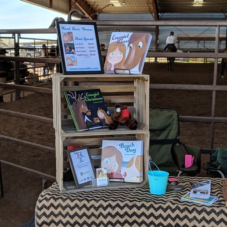 there is a display with books on it at the horse show and other things to read