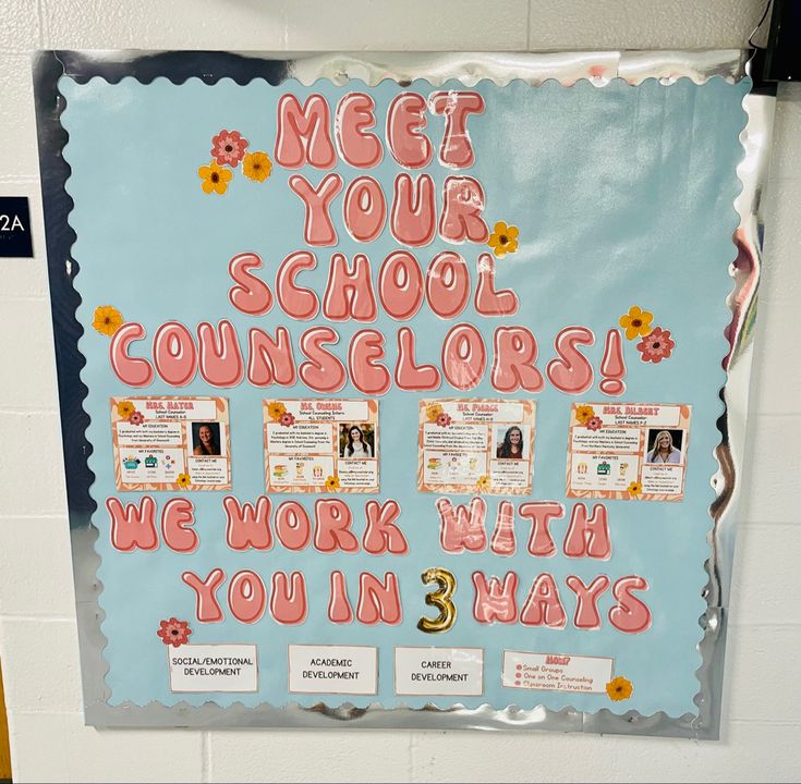 a bulletin board with flowers on it in a school classroom setting that says, meet your school counselors we work with you in 3 ways