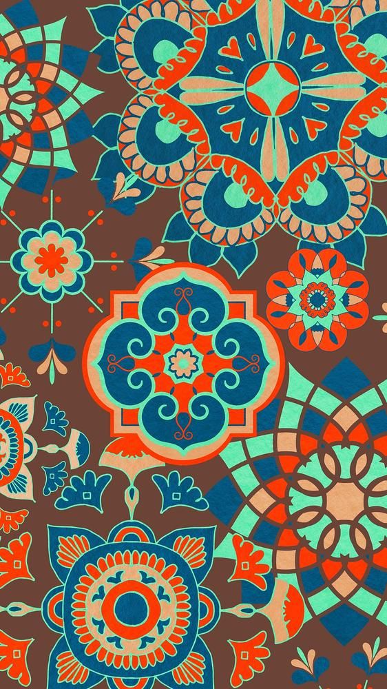 an abstract floral design in blue, red and orange colors on a brown background photo