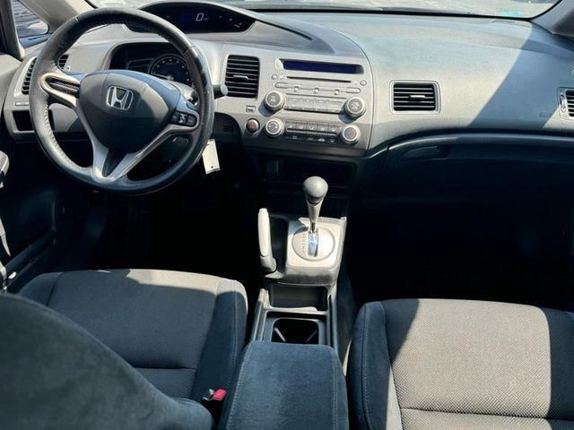 the interior of a car with dashboard and steering wheel